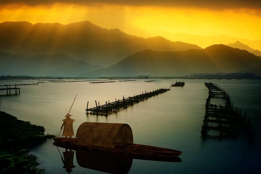 The boat in lake sunset, fish man together catch fish