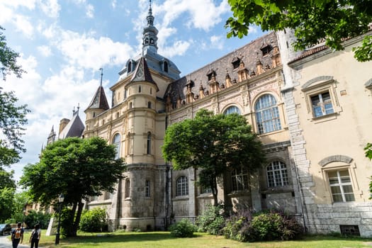 Budapest, Hungary - July 04, 2019: The Vajdahunyad castle, built to celebrate the Millennium, perfectly illustrates the different architectural styles that characterize Hungary. It is partly inspired by the castle of Honedoara (Transylvania, Romania).