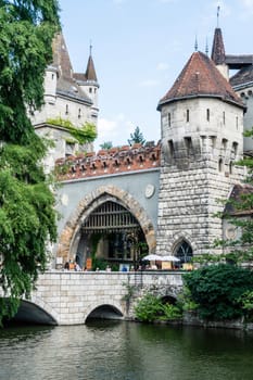 Budapest, Hungary - July 04, 2019: The Vajdahunyad castle, built to celebrate the Millennium, perfectly illustrates the different architectural styles that characterize Hungary. It is partly inspired by the castle of Honedoara (Transylvania, Romania).