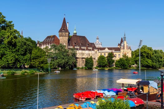 Budapest, Hungary - July 04, 2019: The Vajdahunyad castle, built to celebrate the Millennium, perfectly illustrates the different architectural styles that characterize Hungary. It is partly inspired by the castle of Honedoara (Transylvania, Romania).