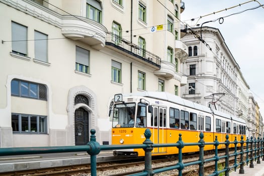 Budapest, Hungary _ July 05, 2019: The Budapest tram network is part of the mass transit system of Budapest, the capital of Hungary. The tram lines carrying nearly 100 million passengers and tourists. Characteristic and very beautiful to see. Budapest, Hungary.