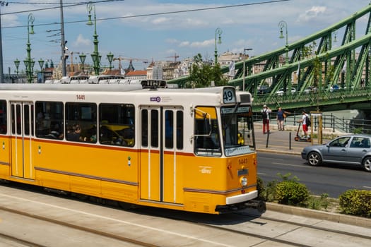 Budapest, Hungary _ July 05, 2019: The Budapest tram network is part of the mass transit system of Budapest, the capital of Hungary. The tram lines carrying nearly 100 million passengers and tourists. Characteristic and very beautiful to see. Budapest, Hungary.
