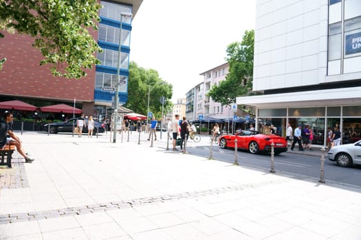 Frankfurt, Germany - July 06, 2019: Pedestrians and road traffic at the street Katharinenpforte corner Bleidenstraße on July 06, 2019 in Frankfurt...