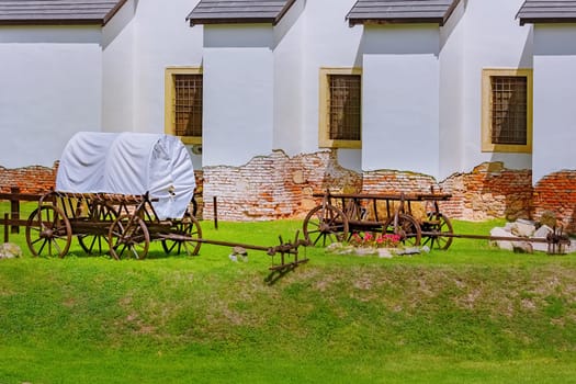 An Old Covered Wagon in the Courtyard