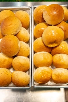 dinner roll bun in basket of buffet line