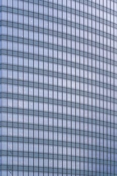 Urban abstract - window facade of business center office building with reflections and colours. Philadelphia PA USA