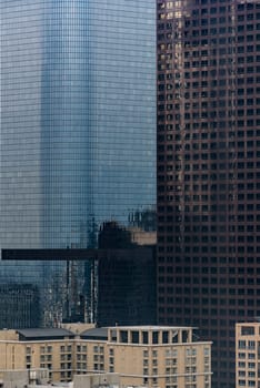 Urban abstract - window facade of business center office building with reflections and colours. Los Angeles CA USA.