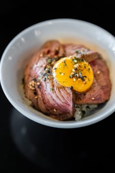 Wagyu beef gyudon Donburi with egg Japanese Groumet cuisine