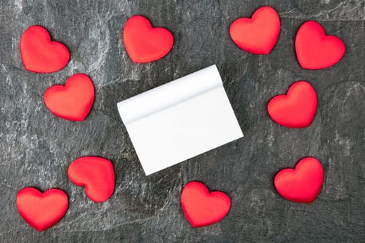 Little velvet hearts with a blank calendar. Concept romantic.