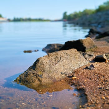 Bank of the River Elbe near Magdeburg on the Elbe Cycle Route in summer at low tide