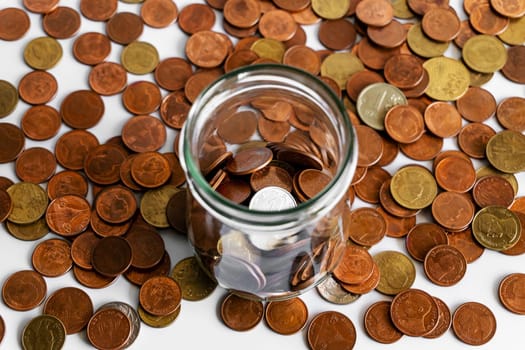 Growing money, Save money and account banking for finance business concept, Coin in bottle on white background, Savings for retirement and investing concept