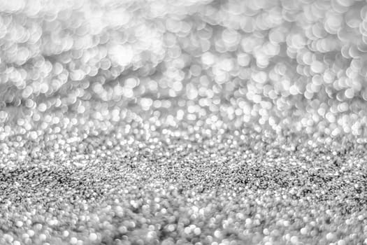 Glitter light abstract silver bokeh christmas light blurred background