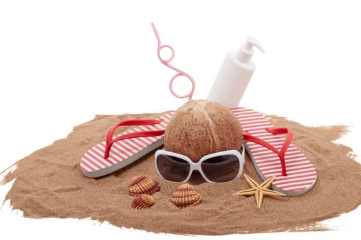 Beach accessories: flip flops, sunglasses, sunscreen, seashells and coconut drink, lying on the sand on white background. Concept of sea vacation and travel. Summer background, Protection from uv