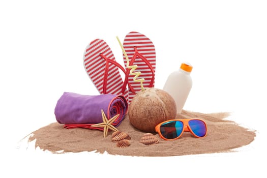 Beach accessories: flip flops, sunglasses, sunscreen, towel, seashells, coconut drink, lying on the sand on white background. Concept of sea vacation and travel. Summer background, Protection from uv
