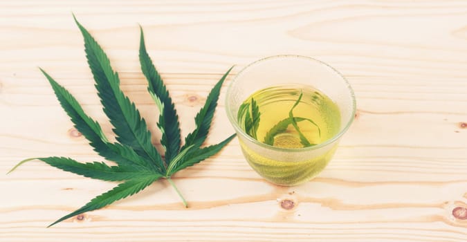 marijuana herbal tea served in glass teacup
