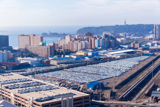 Durban harbor port car terminal export import landscape from birds-eye air position.