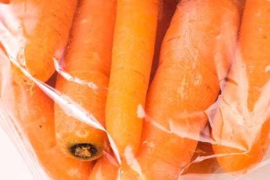 Bunch of organic Carrots packaged in plastic bag