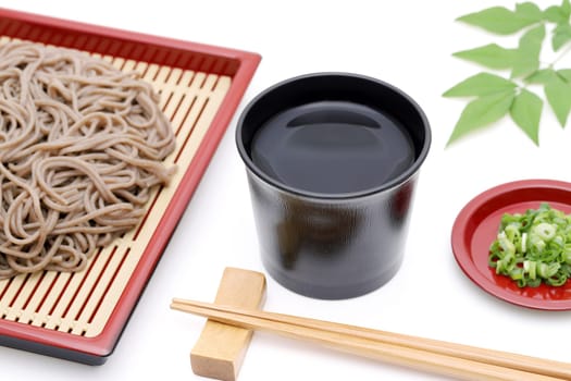Japanese Zaru soba noodles on plate on white background