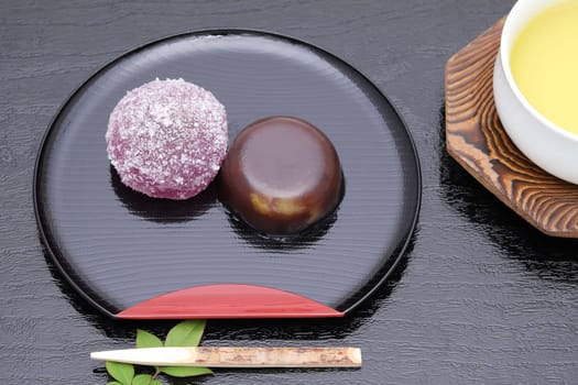 Japanese traditional confectionery, red bean jelly yokan on black background
