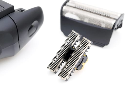 Blade cutter head and shaver replacement foil for electric razor on white background