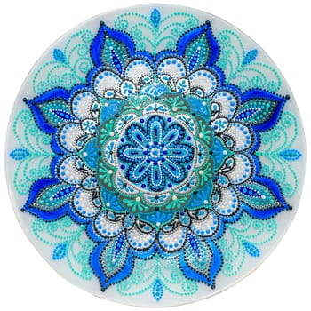 Decorative ceramic dish painted with hands. Art, handmade. Pattern mandala
