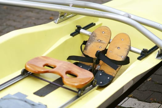 The close-up of a rowing boat's seats in rowing sport.