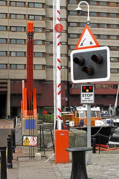 Moveable bridge sign lights and barrier ramp