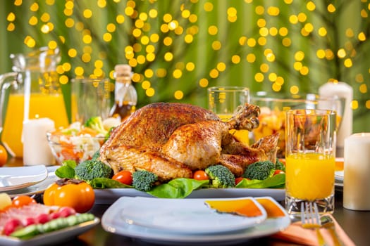 Celebrating Thanksgiving with roasted turkey on festive table. Roasted turkey on festive table for Thanksgiving celebration