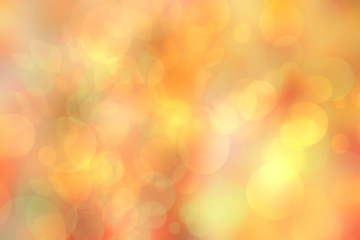 A festive abstract golden yellow pink gradient background texture with glitter defocused sparkle bokeh circles. Card concept for Happy New Year, party invitation, valentine or other holidays.