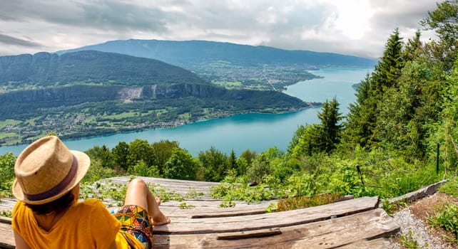woman looking at the landscape of the Lake Annecy