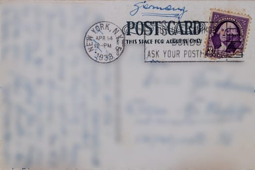 Postcard vintage. Reverse of postcard of 5th Street in New York, postmarked of April 14, 1938 with a U.s. postage stamp 3 cents george washington mailed to Germany. Macro.