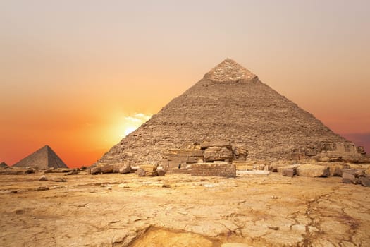 Sunset in the desert and the Pyramid of Khafre, Egypt.