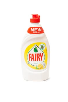 Chisinau, Moldova - July 23, 2019: A bottle of lemon Fairy washing-up liquid. Fairy brand is owned by Procter & Gamble. Isolated on white background