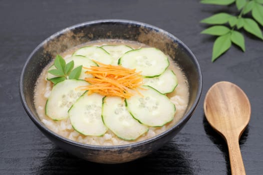 Japanese hiyajiru cold miso soup on black background