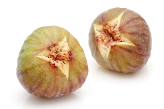 Ripe sweet fig isolated on a white background