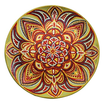 Set of decorative ceramic dishes hand-painted with acrylic paints floral pattern isolated on white background.