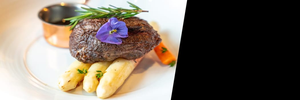 Grilled Salmon Fillet with grilled white asparagus serve with tomato and spinachd esigned for using as web banner