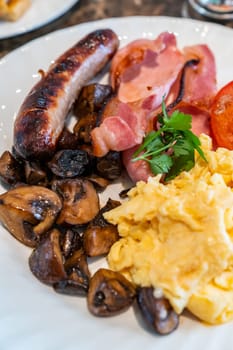 Full English Breakfast on Table with coffee