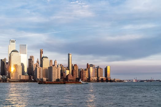 New York city Manhattan skyline cityscape at sunset from New Jersey.