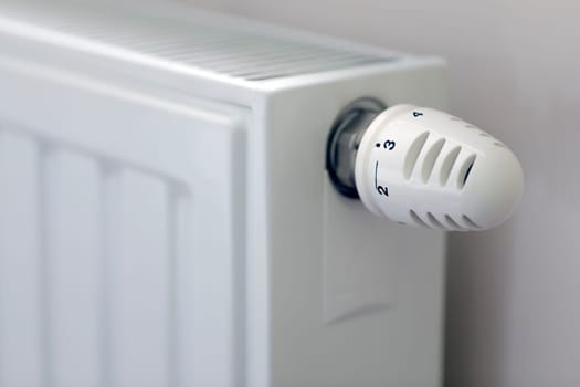 Heating radiator with temperature regulator close-up