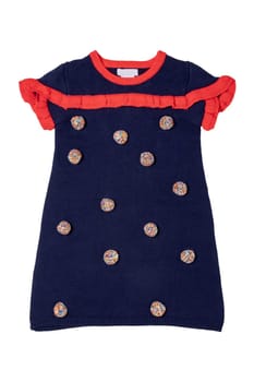 Clothes for children. A beautiful blue sleeveless dress with red collar, ruffles and with fluffy fabric balls isolated on a white background. Little girl autumn and spring fashion.