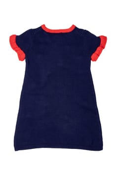 Clothes for children. A beautiful blue sleeveless dress with red collar, ruffles and with fluffy fabric balls isolated on a white background. Little girl autumn and spring fashion. Back side.