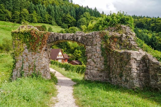 Historic archway from castle ruin Schauenburg in Blackforest Germany