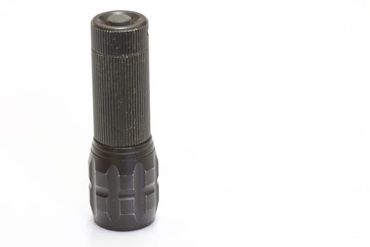 flashlight black color isolated background closeup