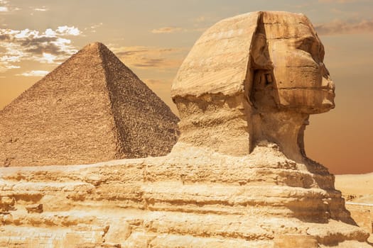 The Sphinx and the Pyramid of Cheops, close view, Giza, Egypt.