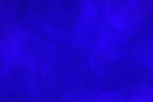 Abstract light blue bokeh christmas light blurred background