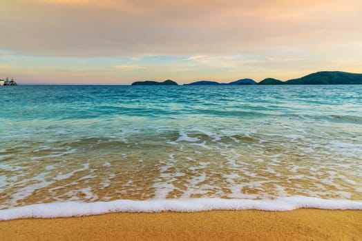 Beach sunset or sunrise with colorful of cloud sky and sunlight in evening light