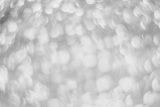 Abstract silver light bokeh christmas light blurred background