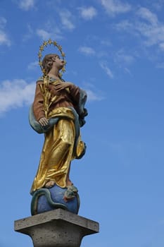 Madonna statue at the fountain in front of the Beilngrieser parish church