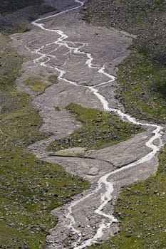 Ödenwinkelkees with glacier stream in the Hohe Tauern